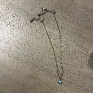 Francesca’s blue iridescent stone choker